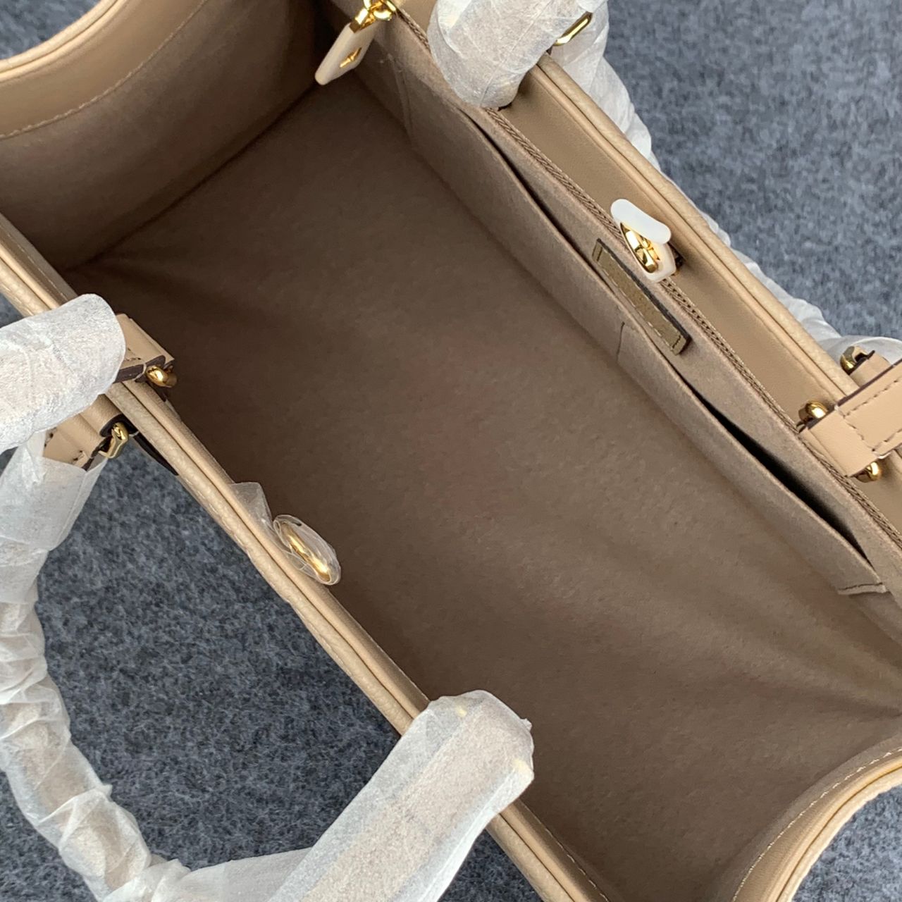 LV Onthego MM Beige Monogram Empreinte Tote Bag