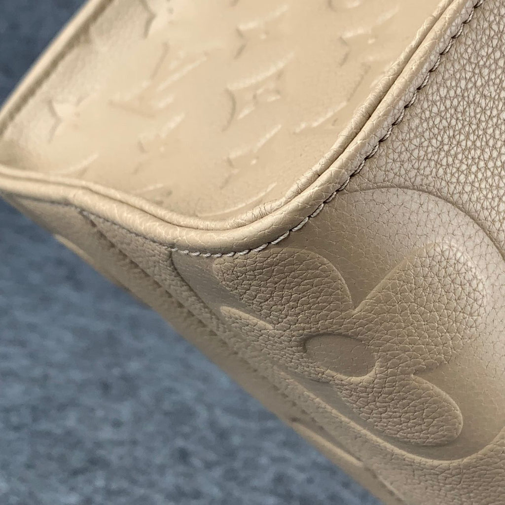 LV Onthego MM Beige Monogram Empreinte Tote Bag
