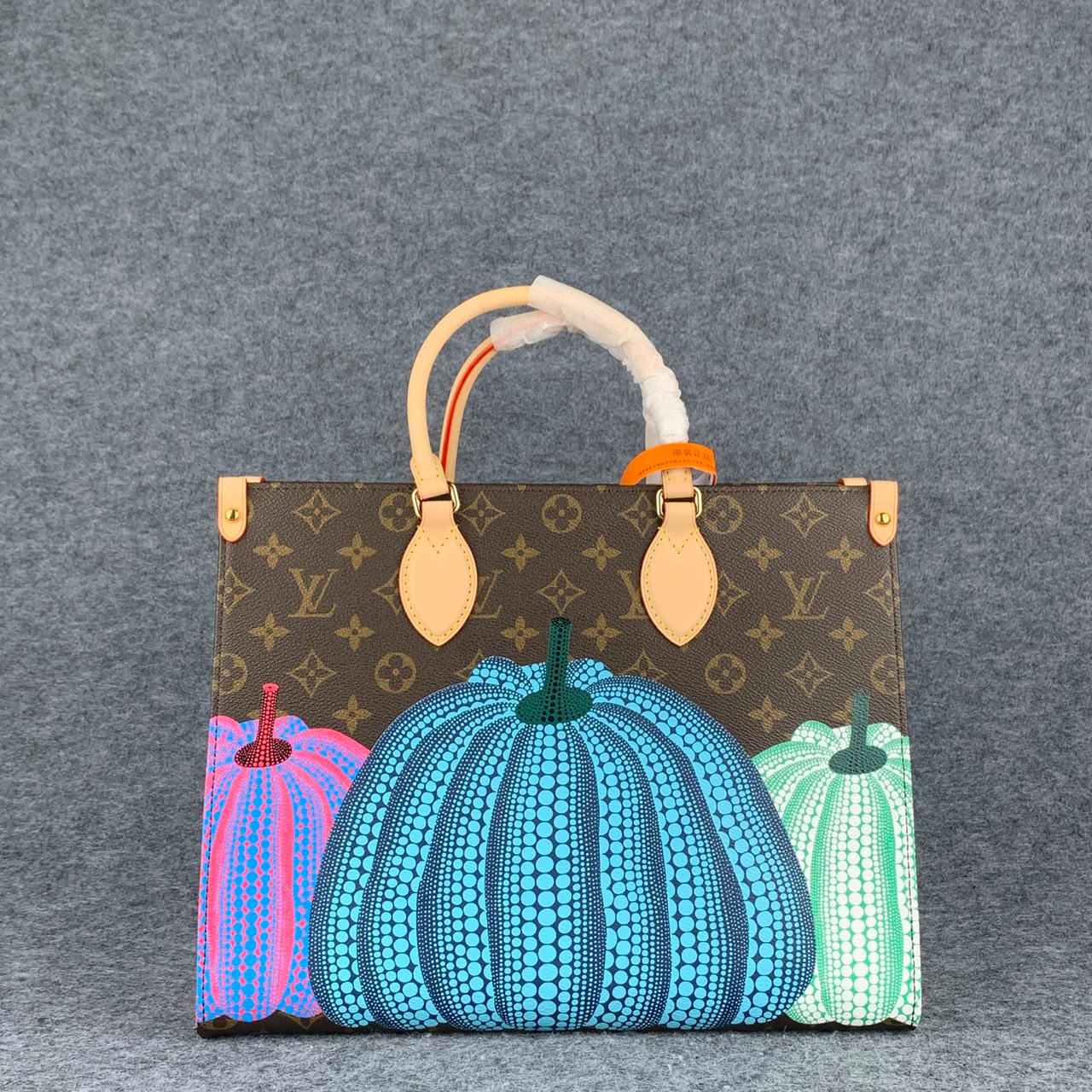 LV YK Onthego PM Pumpkin Print