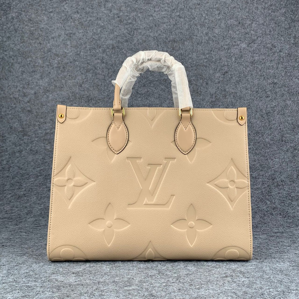 LV Onthego MM Beige Monogram Empreinte Tote Bag