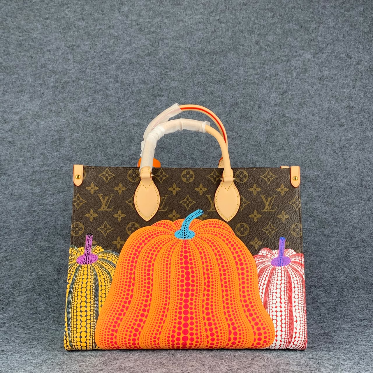 LV YK Onthego PM Pumpkin Print