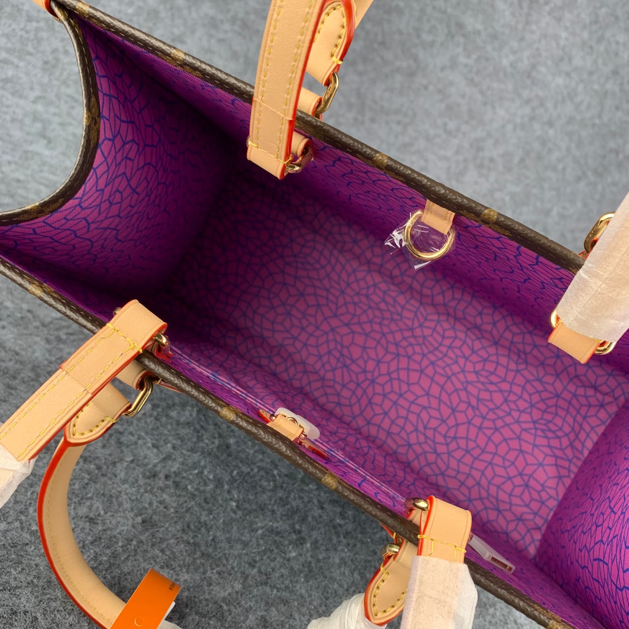 LV YK Onthego PM Pumpkin Print